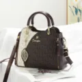 Stylish color-blocked handbag with letter print, top handle and chic leaf pendant for women. - Letter-Coffee