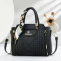 Black embossed top-handle handbag with silk scarf detail, elegant women shoulder bag. - Black