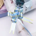 Medium blue pull bow with elegant gold edge for flower wrapping and gift box decoration. - Light Blue with Gold Trim