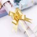 Gold pull bow ribbon for gift wrapping, flower bouquet decoration and festive party supplies. - Gold Gold Edge