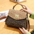 Retro brown printed shoulder bag for women, elegant top handle crossbody handbag with gold lock. - FIDM Style / Khaki