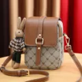 Stylish monogram crossbody phone bag with brown leather flap and cute rabbit charm for women. - Inverted A - Earthy Yellow Flap / Without Bear Charm