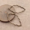 Bronzene hohle Blatt Anhänger DIY Schmuck Zubehör 65x34mm Basteln Zubehörteile - Antikbronze