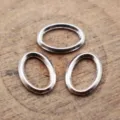 Antiksilberne ovale Ringe, kleine Metallverbinder für DIY Schmuckherstellung und Anhänger. - Antiksilber