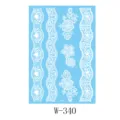 White lace tattoo stickers featuring various floral and wave patterns on a blue sheet. - Lace Tattoo Style(W-340)