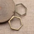 Bronzener hohler geometrischer sechseckiger Anhänger DIY handgefertigter Schmuck Zubehör. - Antikbronze