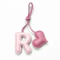 Detail shot of pink leather letter R and heart bag charm with fine stitching and hanging strap. - Light Pink with Pink Heart
