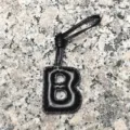 Black leather letter B bag charm detail, premium sheepskin initial keychain pendant accessory. - Uppercase Letter B / Black