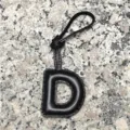 Black leather letter D bag charm keychain, initial alphabet pendant for women car accessory. - Capital Letter D / Black
