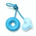 Light blue leather bag charm with donut and heart pendants, handcrafted stitching. - Sky Blue with Light Blue Heart