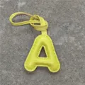 Breloque de sac lettre A en cuir jaune, charm pendentif initial porte-clés pour sac à main. - Light jaune