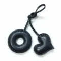 Black leather donut and heart bag charm with handmade stitching, perfect stylish accessory. - Black with Black Heart