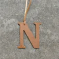 Brown leather letter N bag charm with strap, elegant accessory for women's handbags. - Brown
