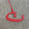 Red leather Arabic letter bag charm and car hanging ornament with a matching strap. - Red