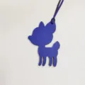 Detailed view of the cute blue leather animal bag charm pendant, stylish accessory. - Sapphire Blue