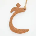 Leather Arabic letter charm detail view, stylish handbag decoration and car keys pendant. - Brown