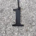 Black leather texture number 1 bag charm DIY numerical pendant accessory detail view - Black