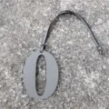 Gray leather number zero bag charm with strap, luxury style diy accessory detail. - Gray