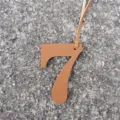 Pelle numero 7 borsa ciondolo arancione cifra pendente DIY accessorio per portafoglio portachiavi - Marrone