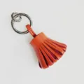 Colgante de bolso con borla de cuero y llavero de coche, accesorio de piel de oveja naranja. - Naranja