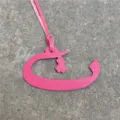 Pink leather Arabic letter bag charm detail view, stylish handbag accessory or car hanging ornament. - Rose Red