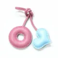 Handmade leather donut and heart bag charm keychain with contrast stitching detail for accessories. - Pink with Light Blue Heart