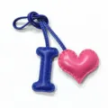 Close-up detail of handmade leather letter I and pink heart bag charm with fine stitching. - Royal Blue with Rose Red Heart