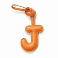 Orange leather letter J bag charm initial keychain for purses and car accessories detail view - Orange
