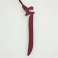 Burgundy leather Arabic letter bag charm, stylish purse accessory and car key pendant detail. - Burgundy