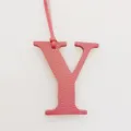 Pink leather letter Y bag charm initial pendant accessory luxury style detail view. - Pink