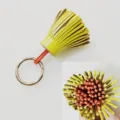 Candy color two-tone genuine leather tassel car keychain and stylish bag charm pendant. - Light Yellow And Orange