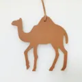Leather camel bag charm with textured brown finish, stylish accessory for women handbags. - Brown