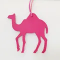 Pink leather camel bag charm detail shot, fine texture strap pendant fashion accessory. - Rose Red