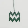 Close-up detail of the green leather Aquarius zodiac symbol pendant with matching leather cord. - Dark Green