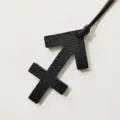 Sagittarius zodiac sign leather bag charm, stylish black constellation keychain accessory for purses. - Black