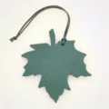 Green leather maple leaf bag charm, stylish car pendant accessory with black strap. - Dark Green