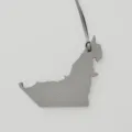 Genuine leather bag charm featuring UAE map shape in grey, elegant leather pendant for handbags. - Gray
