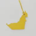 Yellow genuine leather bag charm detailed close-up showing fine texture and unique animal shape. - Yellow