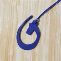 Blue leather Arabic letter bag charm detail view, stylish handbag pendant accessory for women. - Blue