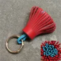 Zweifarbiger Leder Quasten Taschenanhänger mit Metallring, roter blauer süßer Auto Schlüsselanhänger. - Himmelblau Innen mit Hellrot