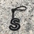 Black leather letter S charm pendant, stylish alphabet initial bag accessory for women. - Uppercase Letter S / Black