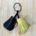 Dual color leather tassel keychain bag charm, stylish car key ring accessory for women. - Yellow/Black