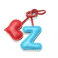 Handmade leather bag charm with red heart and blue letter Z pendant for stylish accessories. - Sky Blue with Bright Red Heart