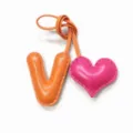 Handcrafted leather letter V and pink heart bag charm with orange strap loop detail. - V Orange with Rose Red Heart