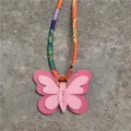 Mini colgante de bolso de mariposa de cuero con accesorio de cinta de pañuelo de seda - Rosa Y Rosa Roja