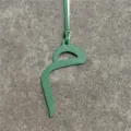 Green textured leather letter shape bag charm detailed view, stylish pendant accessory. - Green