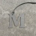Grey leather letter M bag charm pendant, stylish alphabet keyring accessory for purses and cars. - Gray