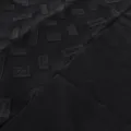 Close-up of black casual set fabric showing unique geometric textured pattern and soft handfeel. - M / Top And Bottom / Black