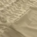 Close-up fabric detail of casual suit featuring textured pattern and smooth contrast panel. - M / Top And Bottom / Khaki