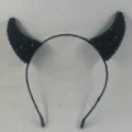 Black rhinestone devil horns headband detail shot, perfect for Halloween and costume party wear. - Rhinestone Horn Headband / Black